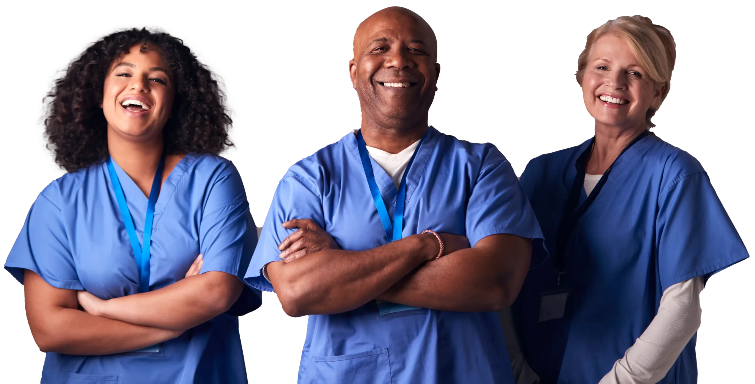 Three healthcare professionals, two women and one man, standing and laughing together, showcasing teamwork and camaraderie in a healthcare setting.